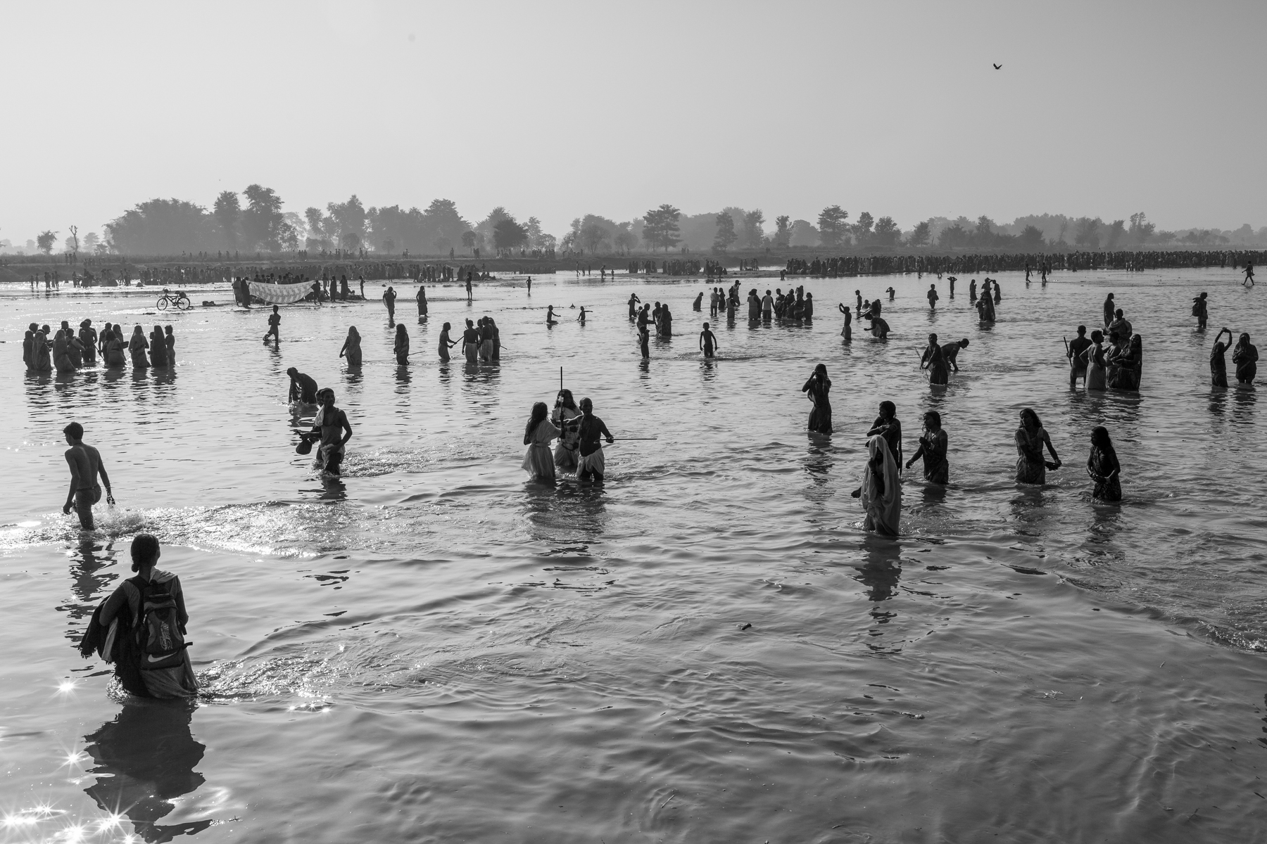 Thousands of people visit the Kamala River on full moon day to eradicate evil spirits or problems created by the family god Kula-dèvatā. 6 November 2014, Dhanusha, Nepal.