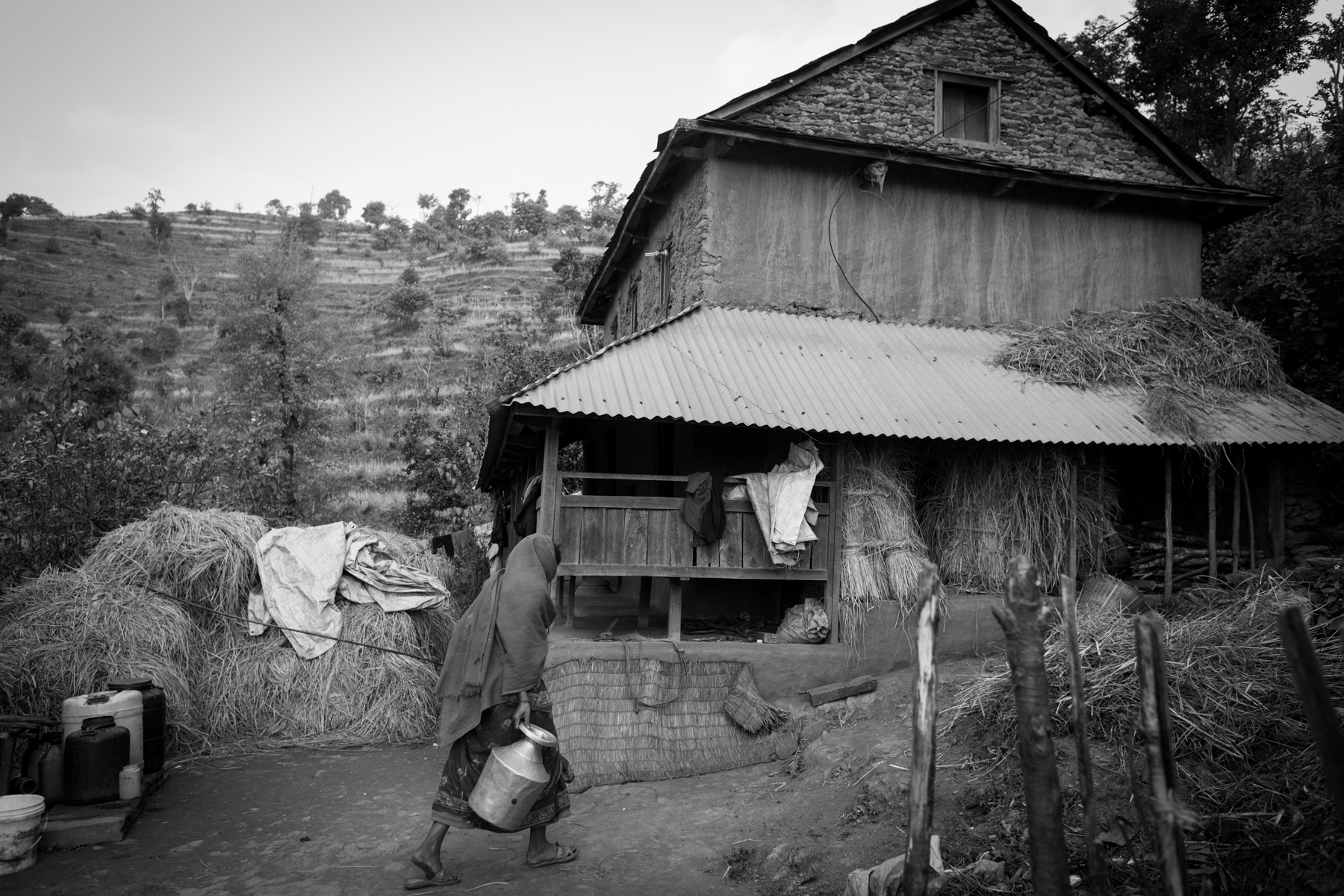 Kulpi B. K., 55, a Dalit woman at her house in the village of Ningalapani. Kalpi was beaten by neighbours and left for dead in
2010. “As I live alone, I face
discrimination every day from some of the villagers”. 19 December 2013, Dhading, Nepal.